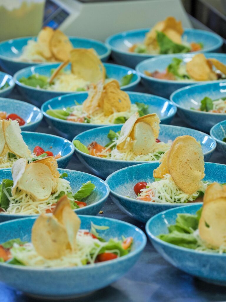 Bowls of healthy salad and snacks