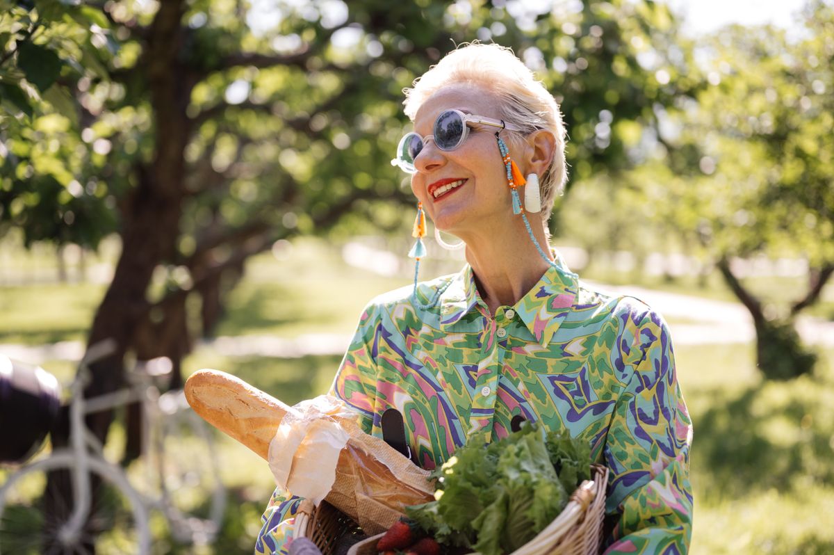 Woman holding fresh vegetables