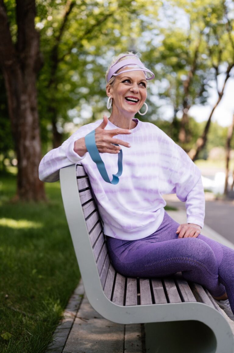 Smiling older woman outdoors