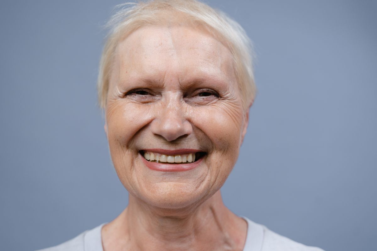 A relaxed woman in her fifties