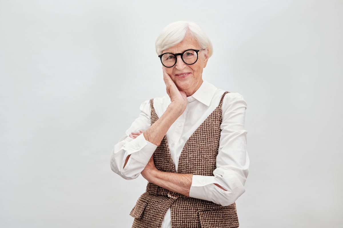 A calm, content woman in midlife