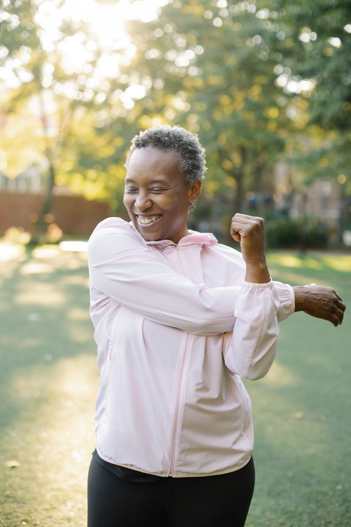 A woman exercising with a resistance band