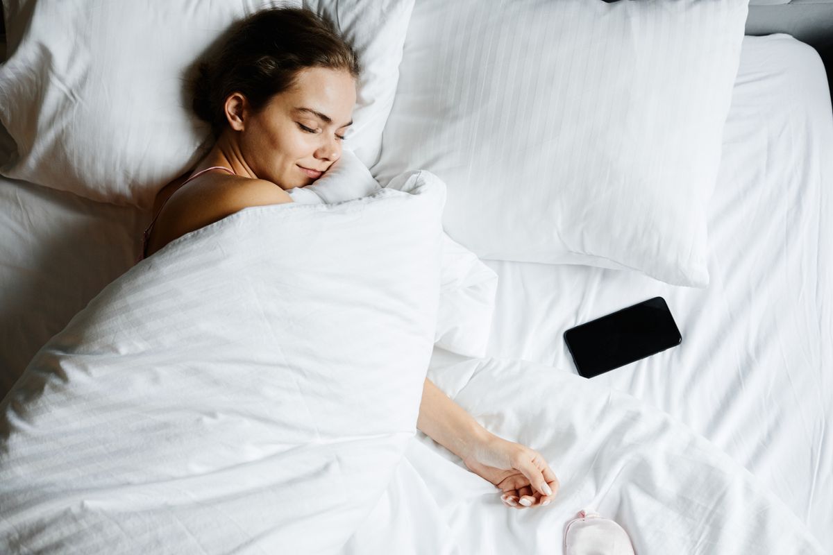 A woman winding down before bed